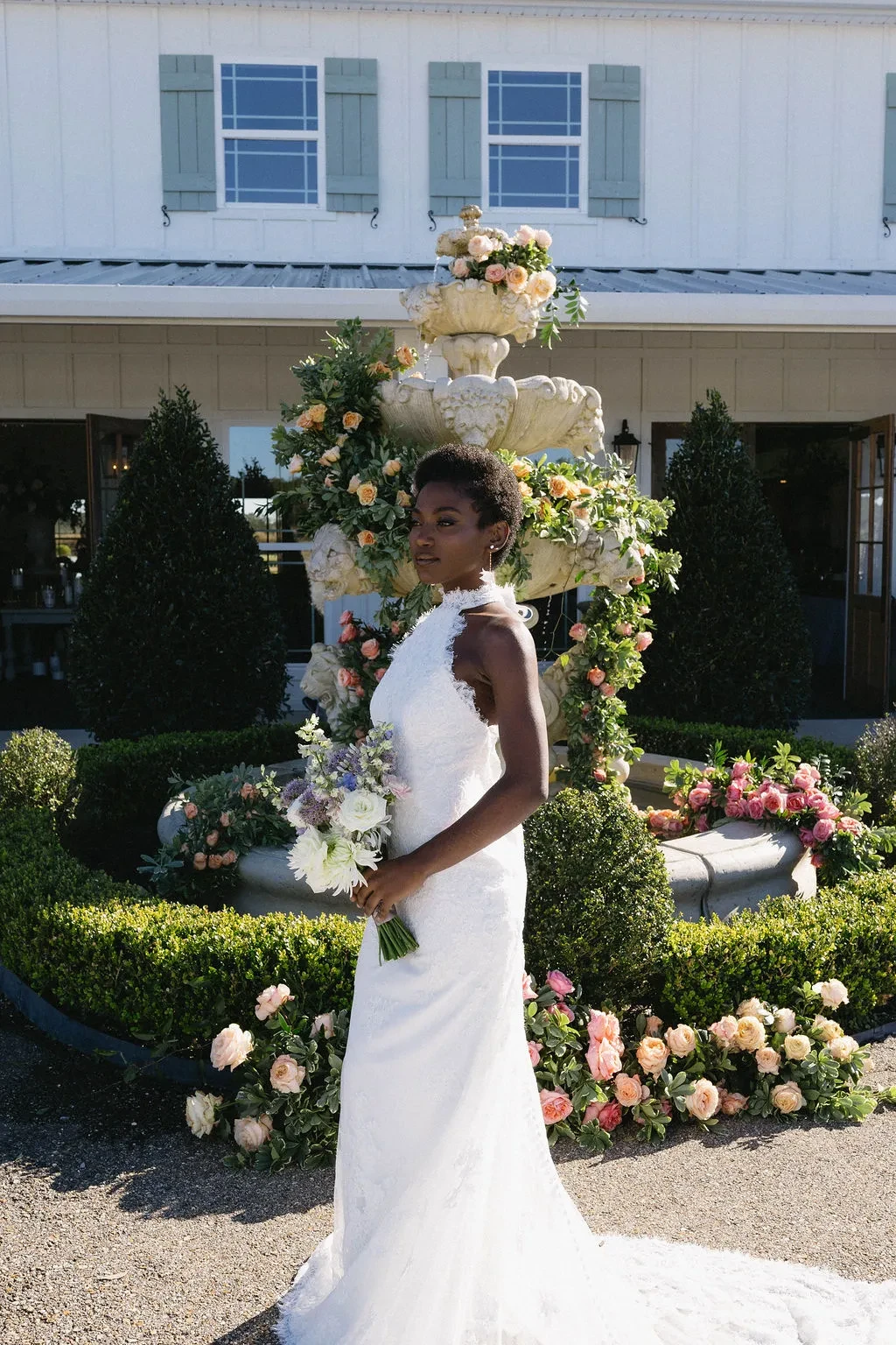 Model wearing white Eddy K Bridal dress