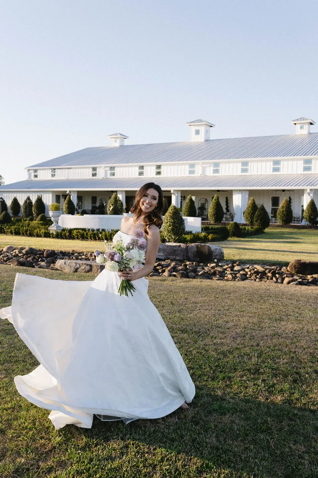 Model wearing white Jenny Yoo Bridal dress