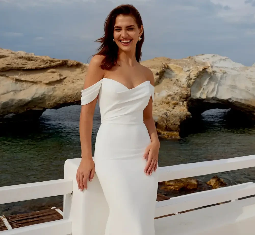 Model wearing white Adore Bridal dress