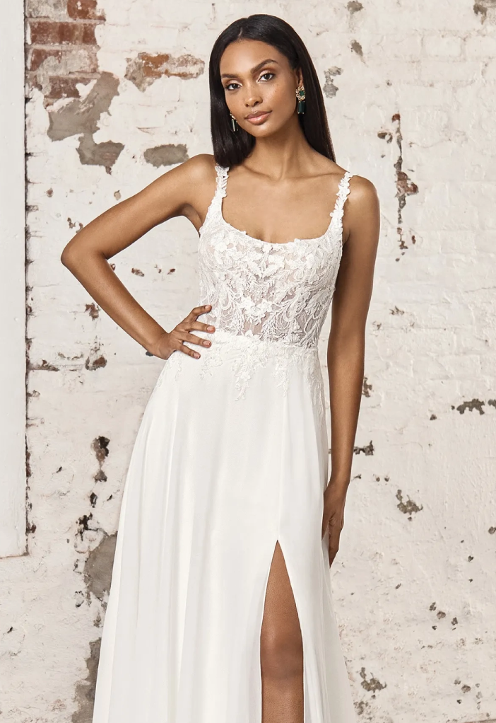 Model wearing white Sincerity Bridal dress