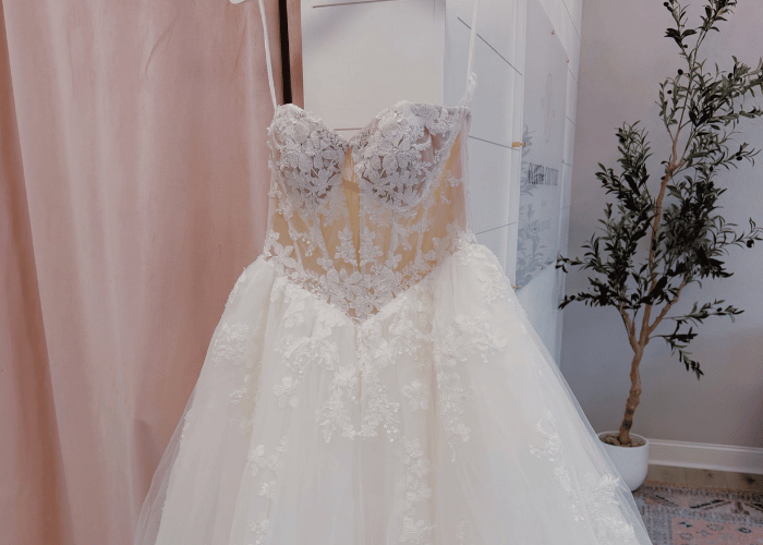 Designer wedding gown with floral lace details for your wedding dress shopping appointment
