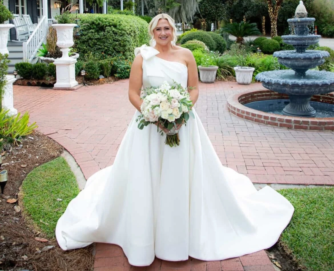 Real Bride holding a bridal bouquet