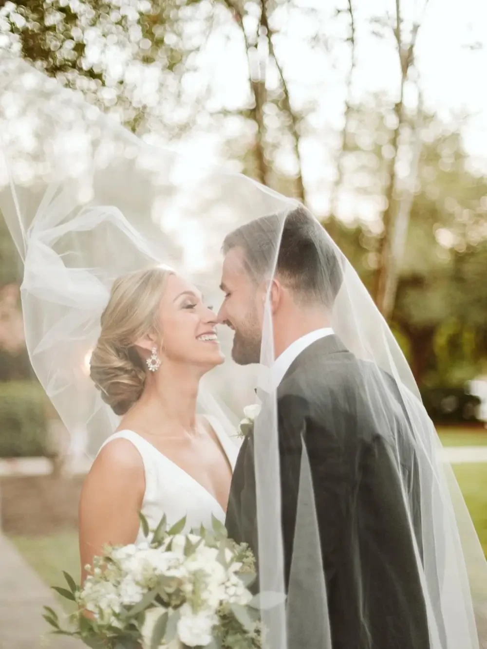 Bride and groom kissing each other